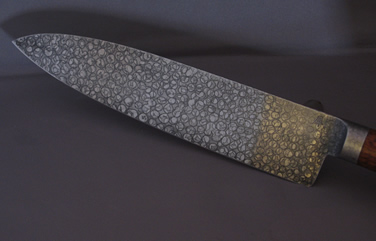 chef's knife with integral bolster blade closeup